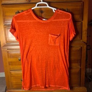 Orange short sleeve shirt with pocket. Size Large.